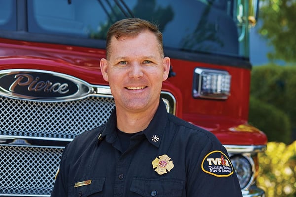 Chief of Tualatin Valley Fire & Rescue in Front of Their New Quantum Fire Truck Pumper