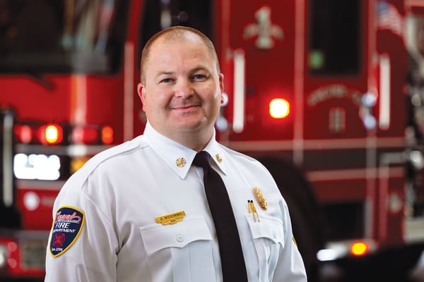 Chief of the City of Concord Fire Department in Front of Their New Enforcer Custom Fire Truck Chassis Pumper