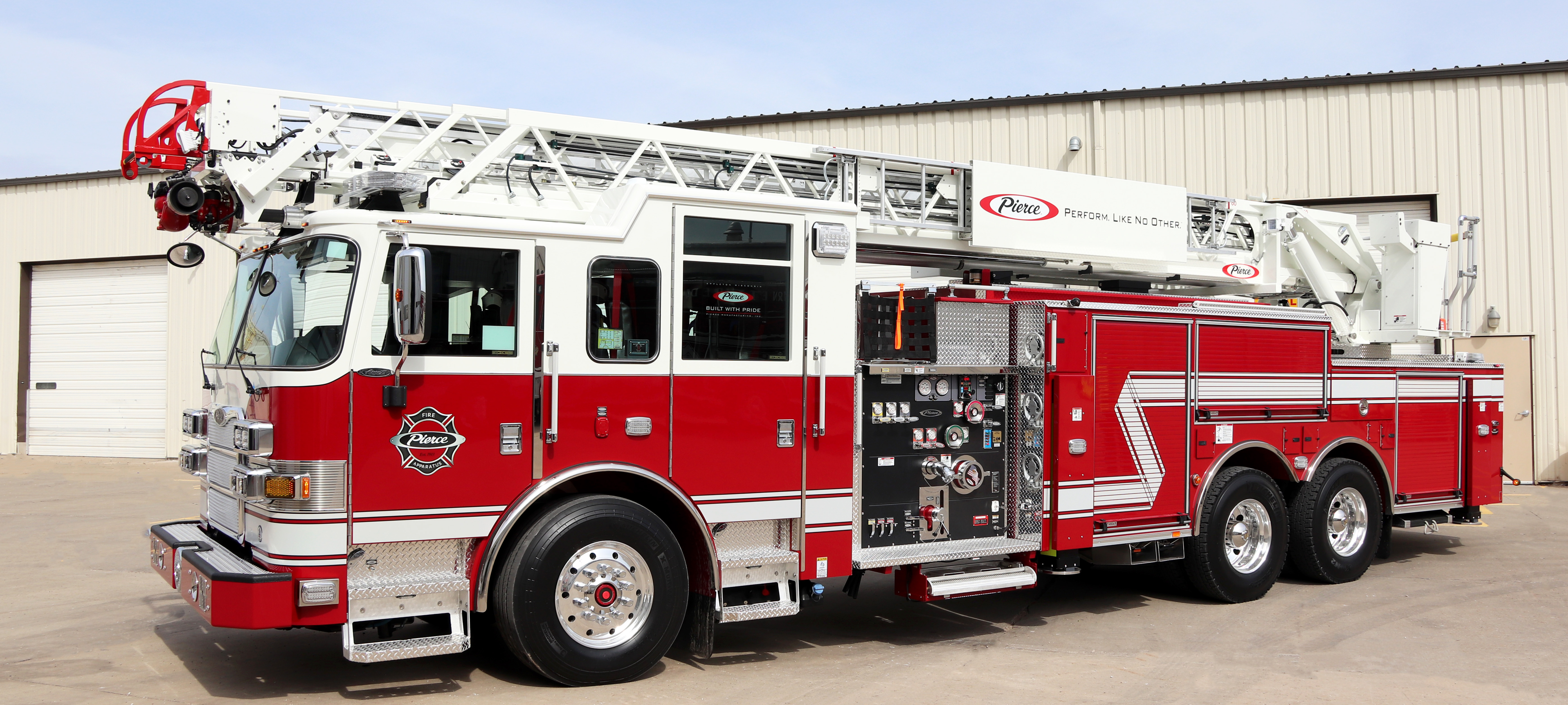 Arrow XT™ 100’ Heavy-Duty Low Profile Steel Aerial Ladder Fire Truck Driver Side Parked In Courtyard-1
