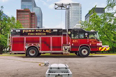 A 3-axis gimbal is a key feature in the Pierce Situational Awareness System by Fotokite as seen in this image of the system and device taking flight.