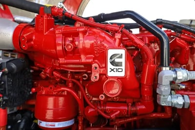 Close-up of a red Cummins X10 diesel engine designed to meet EPA 2027 emissions standards.