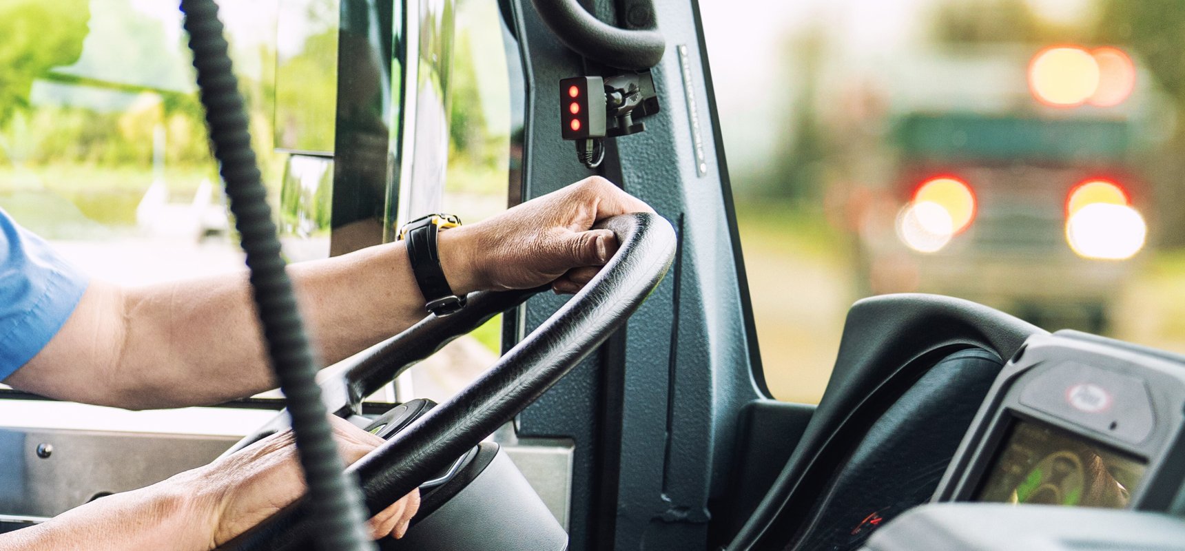 A shot of the inside of a fire truck cab or EMT with the HAAS Alert instrument lighting up and alerting the driver of the pictured emergency vehicle approaching.