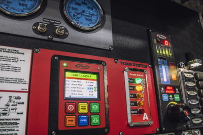 Pierce Husky 12 foam system circuit board with a digital screen showing the foam system’s levels and options for turning the system on and off, foam percentage, and an illuminated gauge showing the fullness of the foam tank’s contents. 