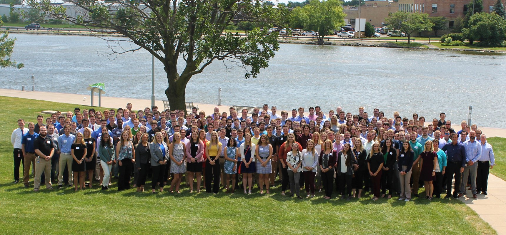 Group shot of Pierce interns and mentors all standing outside