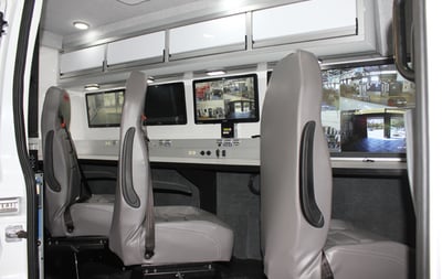 Interior view of the CRU22 Rescue showing an incident command center with counter space and monitors