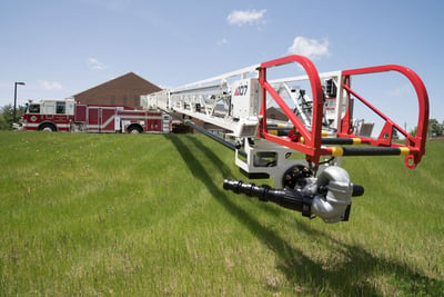 An Ascendant aerial ladder truck in a horizonal placement position demonstrates extensive reach capabilities and below-grade operation.