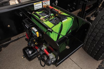 Lithium ion batteries used to power Pierce’s fire truck idle reduction technology system are shown connected to the fire truck frame rail.