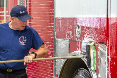 Washing fire apparatus regularly with a warm water and soapy solution can help remove de-icing agents.