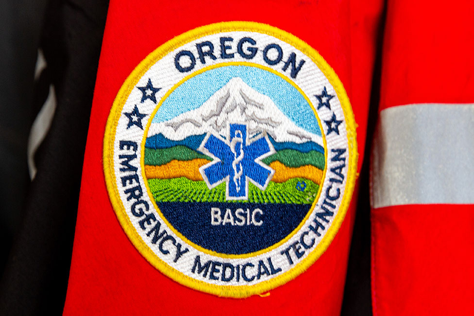 Oregon Emergency Medical Team logoe patch on department jacket hanging in fire station