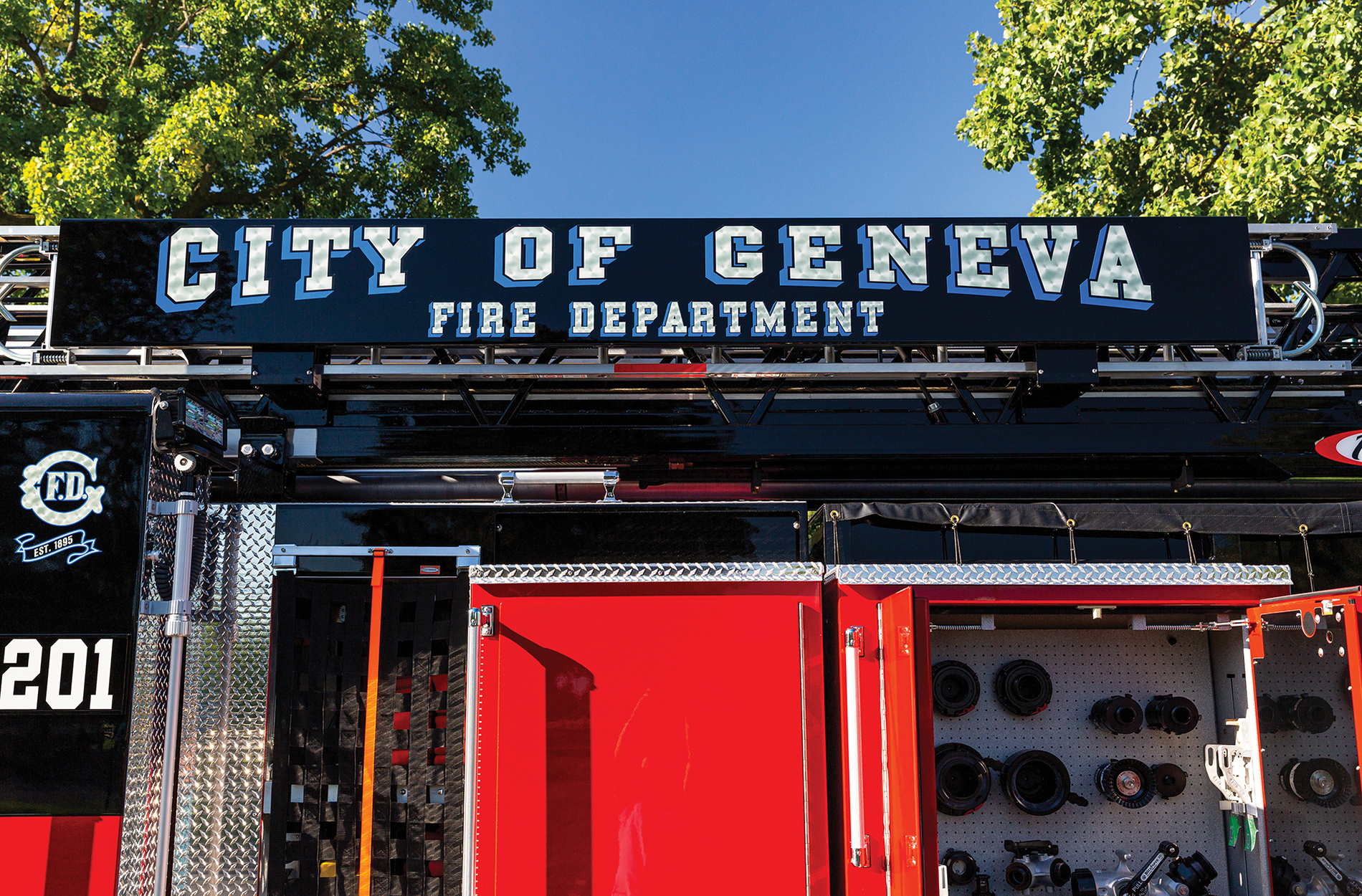 Custom graphics on ladder of an Ascendant 110 Aerial Platform Fire Truck