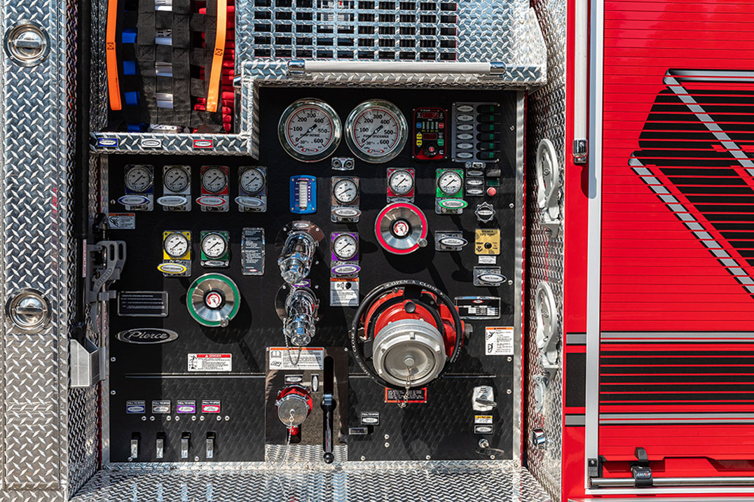 Pump panel of aerial ladder fire truck