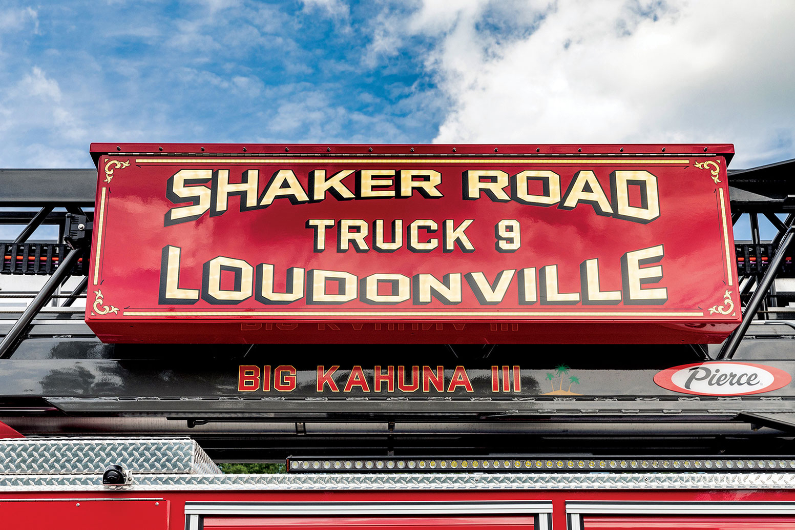 Custom fire truck graphics on aerial platform