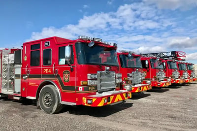 A lineup of red Pierce Enforcer fire trucks for Mississauga Fire and Emergency Services.