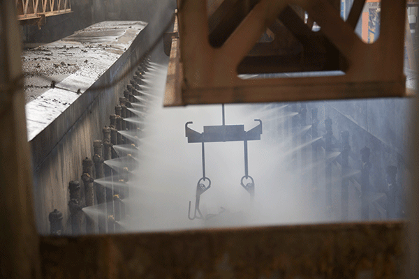 Metal parts for a Pierce Fire Truck being coated during the E-Coat Fire Truck Corrosion Protection Process. 