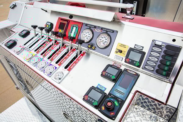 The pump panel on a Pierce Top Mount PUC Pumper.