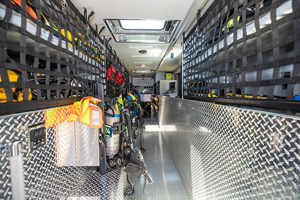Rear Interior of a Pierce Rescue Fire Truck with equipment storage on both sides of the apparatus.   