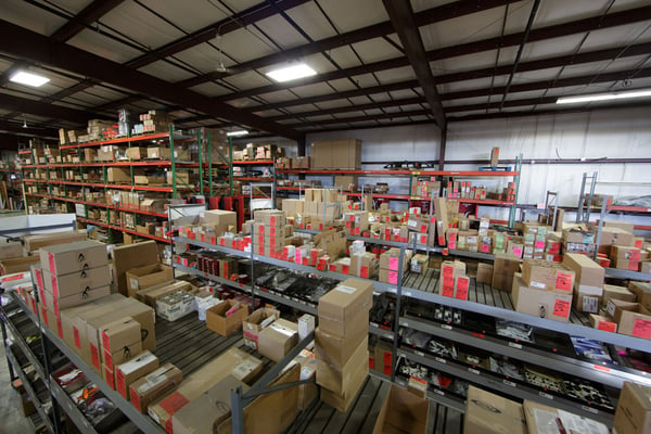 Pierce Product Support Contact Center filled with boxes of parts and accessories. 