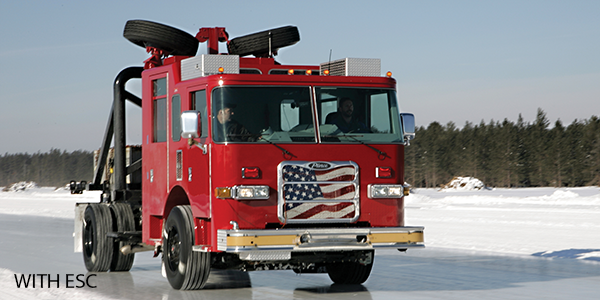 A Pierce Fire Truck driving outside in the snow testing for Stability control with ESC. 