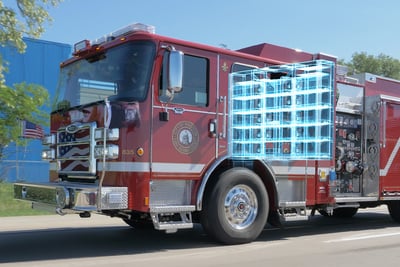 Red fire truck showing parallel electric drive train.