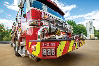 A close up view of the officer side of a fire engine front bumper. 