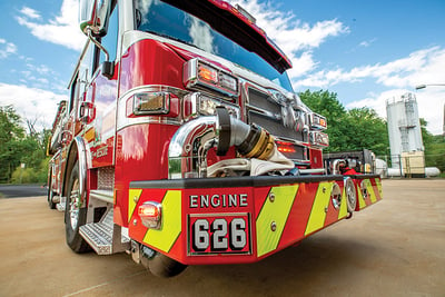 A close up view of the officer side of a fire engine front bumper. 