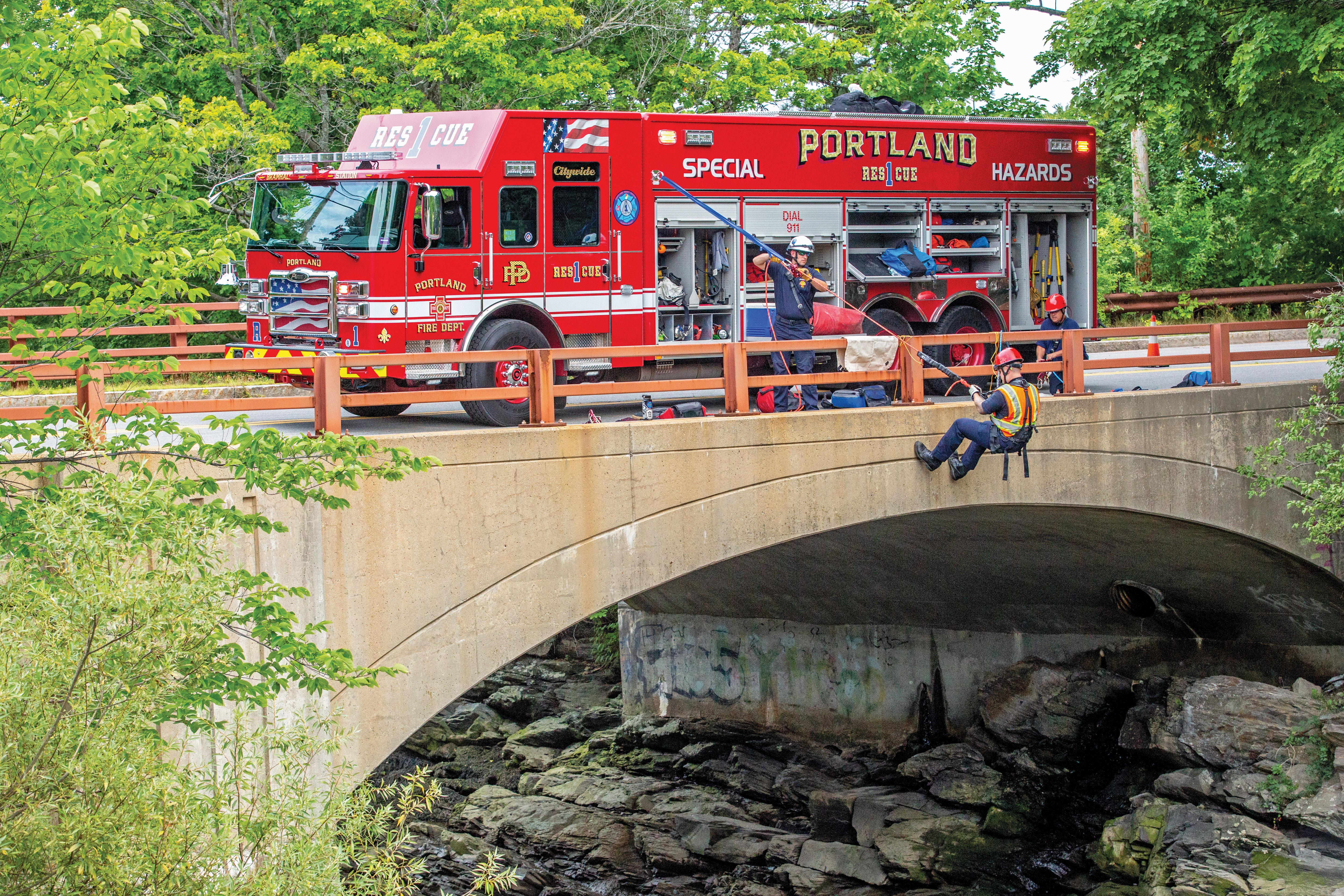 Enforcer Custom Chassis Combination Rescue Fire Truck on Rescue Call by Bridge