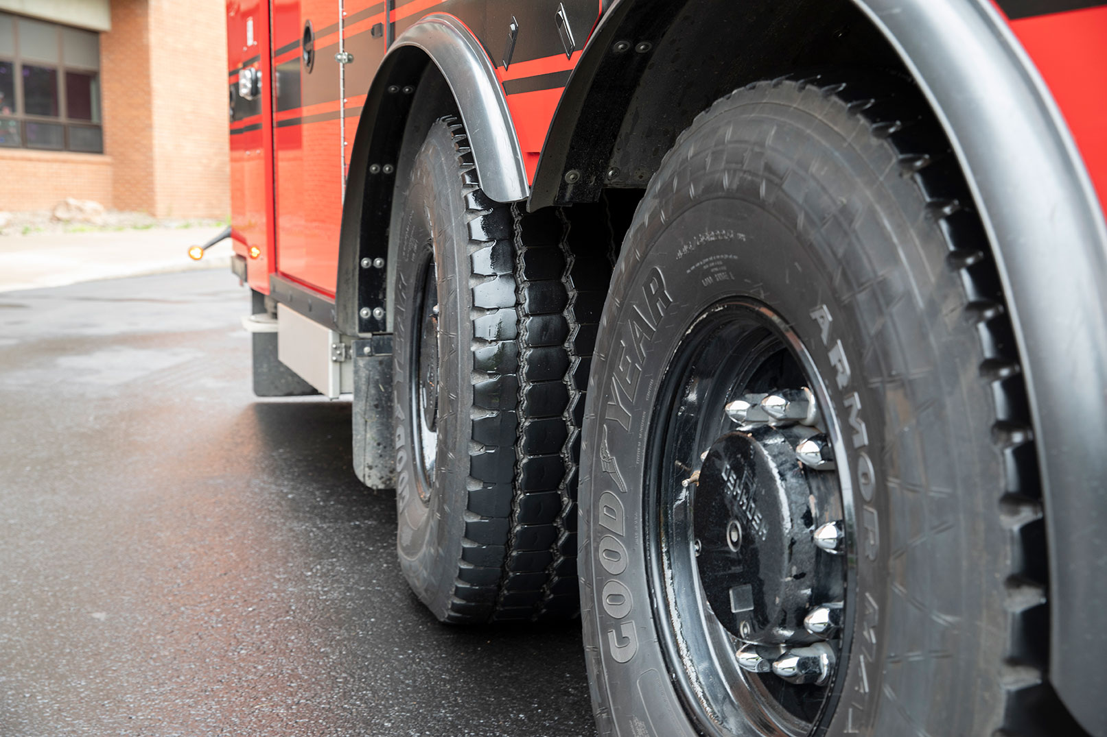The two rear tires on a tandem-axle of a fire truck with TAK-4 T3 Independent Rear Steer.