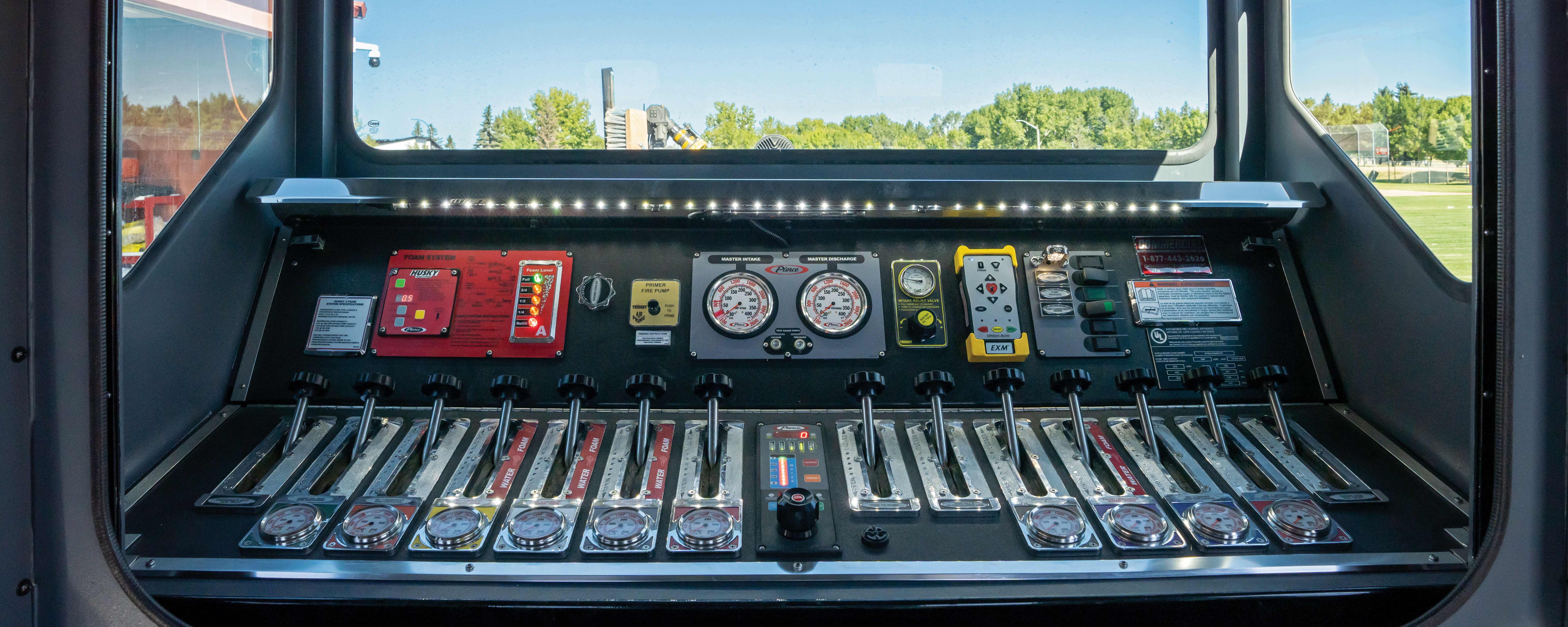 Enclosed Top Mount pump panel on a Pierce Fire Truck. 