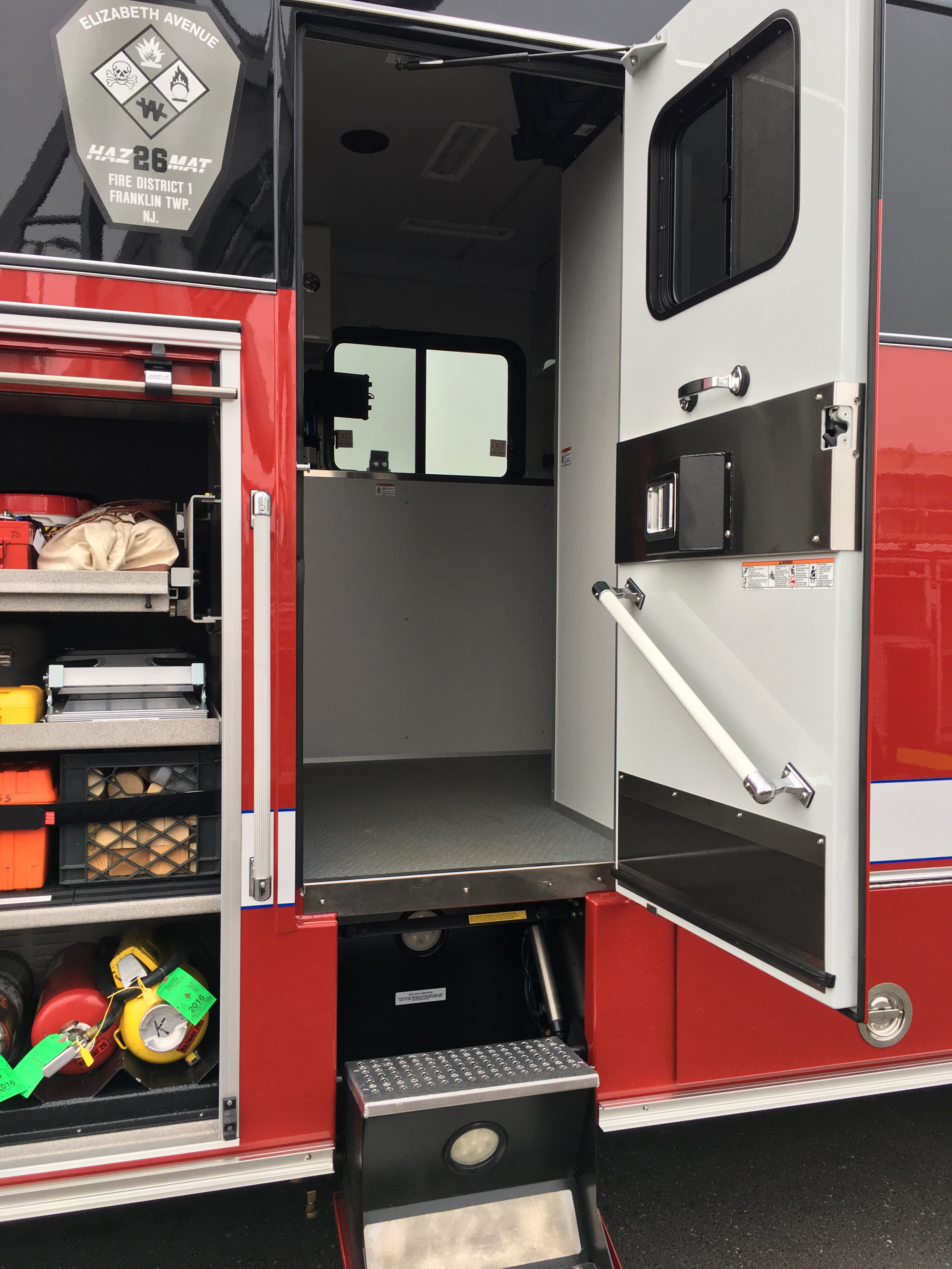 Pierce Combination Rescue Fire Truck with the passenger’s side door open showing the inside of the chassis. 