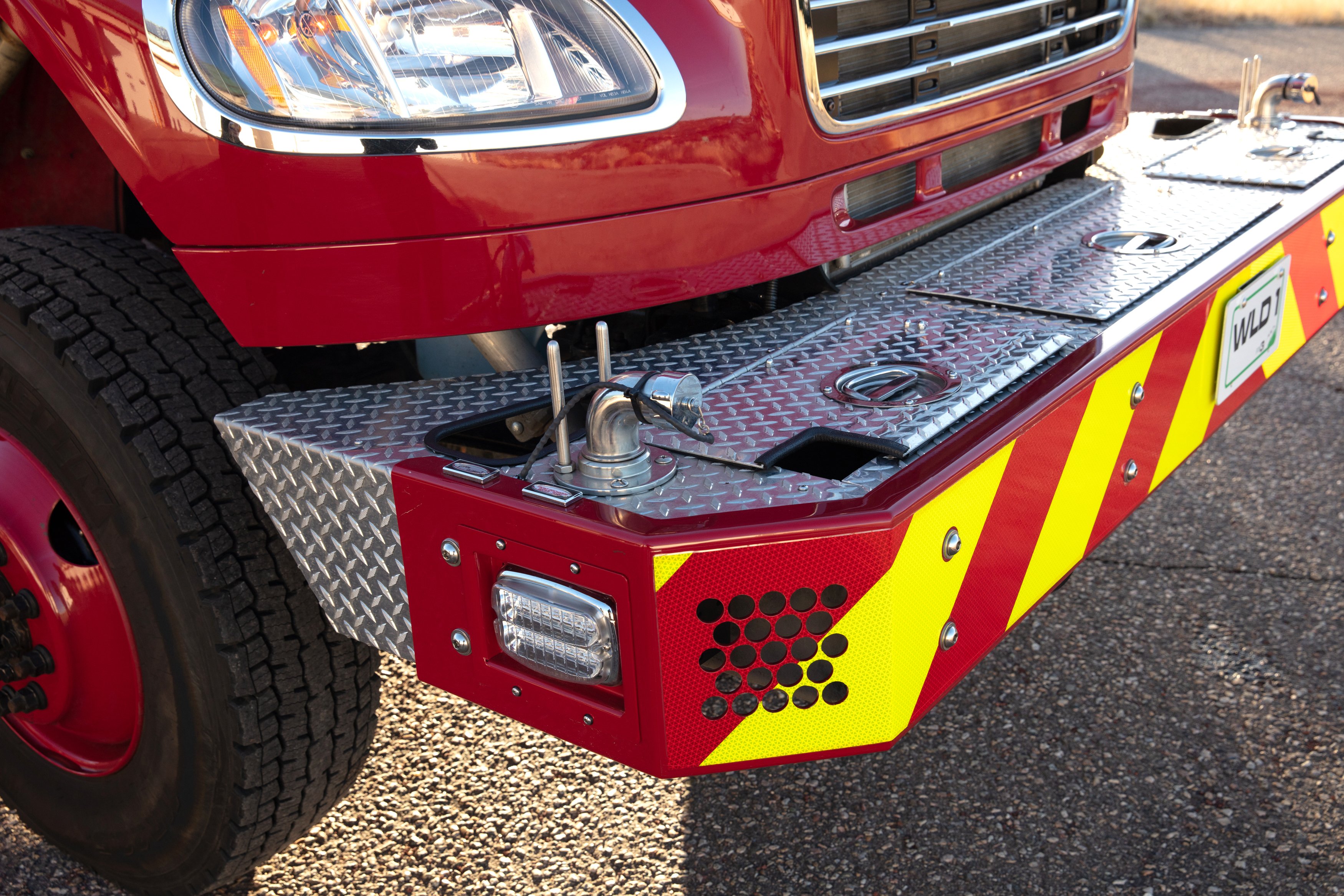 Front bumper of a Pierce BX™ Wildland Fire Truck parked outside. 