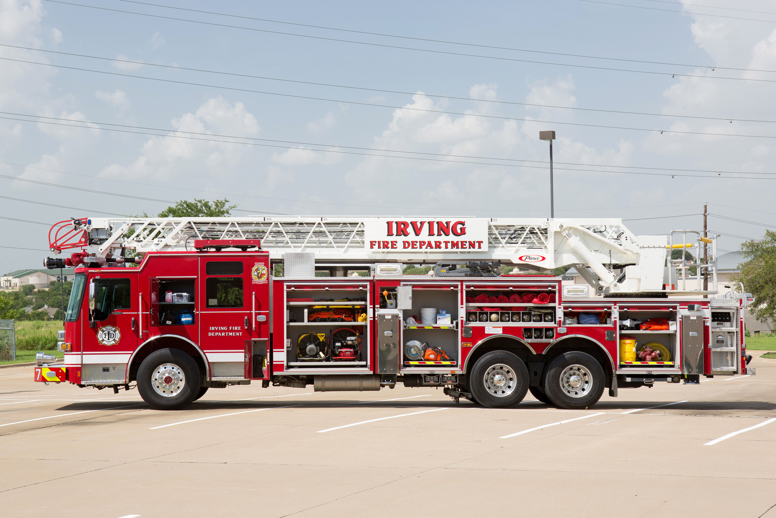 Pierce 105' Heavy-Duty Steel Aerial Ladder Fire Truck Drivers Side Compartments