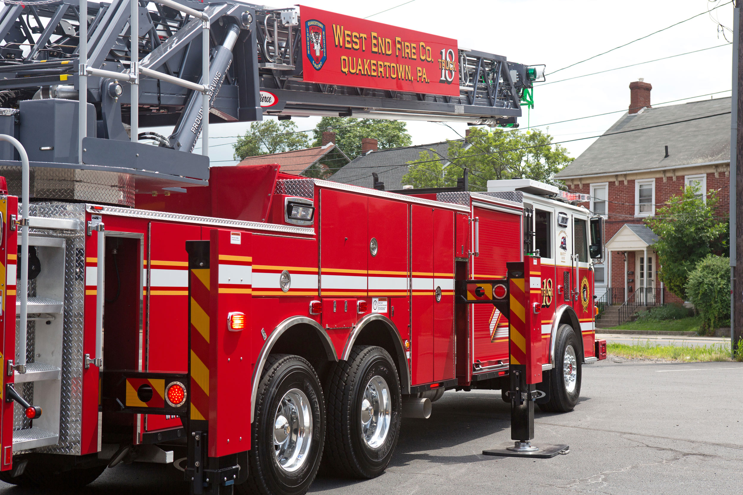 Pierce 105' Heavy-Duty Steel Aerial Ladder Fire Truck Passenger Side
