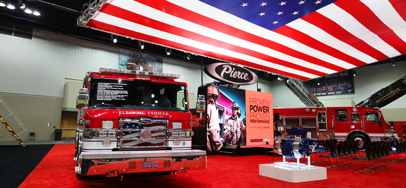 red-fire-truck-parking-under-an-American-flag-FDIC-2023-1